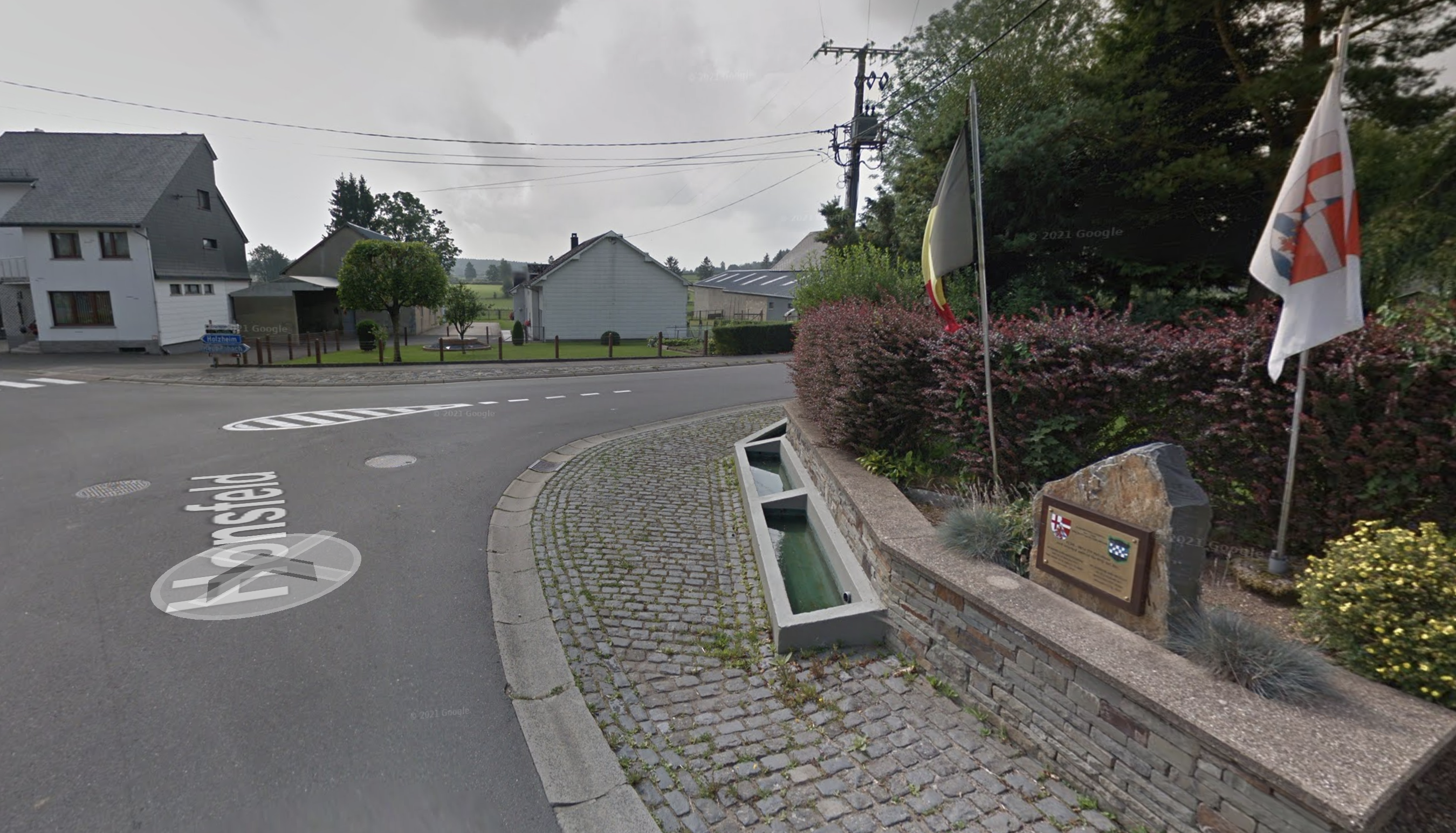 Honsfeld village centre and memorial, modern view
